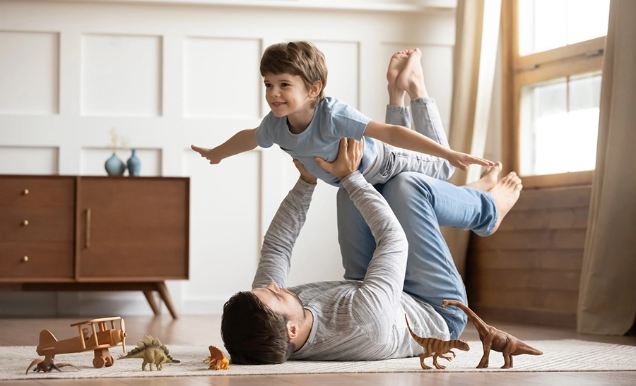 father and son playing